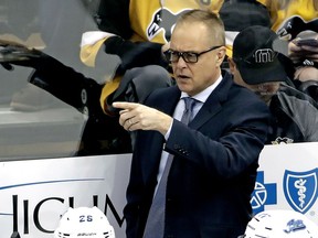 Winnipeg Jets coach Paul Maurice gives instructions during the first period of the team's NHL hockey game against the Pittsburgh Penguins in Pittsburgh, Friday, Jan. 4, 2019. The Penguins won 4-0.