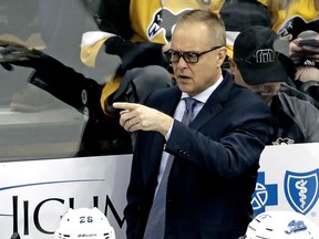 Winnipeg Jets coach Paul Maurice gives instructions during the first period of the team's NHL hockey game against the Pittsburgh Penguins in Pittsburgh, Friday, Jan. 4.