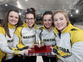 Members of Team Tracy Fleury - East St. Paul Curling Club skip Tracy Fleury, third Selena Njegovan, second Liz Fyfe and lead Kristin MacCuish celebrate their championship victory by winning the 2019 Manitoba Scotties Tournament of Hearts after defeating team Kerri Einarson (Gimli Curling Club) 13-7 at the Gimli Recreation Centre in Gimli, Man., on Sunday.