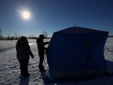 People check to see if an ice fishing hut is full during Winterfest at Fort Whyte Alive in Winnipeg on Sun., Jan. 20, 2019. Kevin King/Winnipeg Sun/Postmedia Network