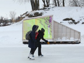Skaters on the Assiniboine River near the Forks glide past a neon plexiglass warming hut art structure on Mon., Jan. 21, 2019. Kevin King/Winnipeg Sun/Postmedia Network