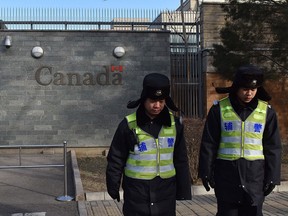 Chinese police patrol in front of the Canadian embassy in Beijing on January 15, 2019. (GREG BAKER/AFP/Getty Images)