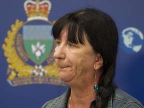 Arlene Last-Kolb pauses as she speaks about her son Jesse who she lost to a fentanyl drug overdose during a Winnipeg Police Service press conference about a carfentanil seizure at the Winnipeg Police Service Headquarters building, Thursday September 29, 2016.THE CANADIAN PRESS/David Lipnowski ORG XMIT: DL102