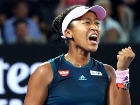 Naomi Osaka celebrates a point in her women's final match against Petra Kvitova at the Australian Open at Melbourne Park in Melbourne, Australia on Saturday, Jan. 26, 2019.