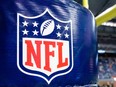 This Aug. 9, 2014 file photo shows an NFL logo on a goal post pad before a preseason NFL football game between the Detroit Lions and the Cleveland Browns at Ford Field in Detroit.