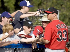 Larry Walker signs autographs for fans in 2006