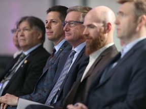 From the left; Ian Wishart, Minister of Education and Training, Mayor Brian Bowman, Blaine Pedersen, Minister of Growth, Enterprise and Trade, Darryl Long of Ubisoft, and Yannis Mallat, CEO of Ubisoft Canadian Studios.  A business announcement was made, by Ubisoft,  in Winnipeg today, regarding video games..  Friday, April 06, 2018.   Sun/Postmedia Network