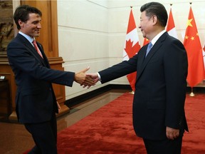 Once seemingly the best of friends, Justin Trudeau is shown here with Chinese President Xi Jinping in Beijing in 2016.