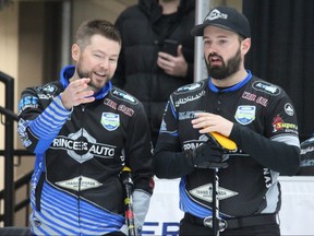 West St. Paul skip Mike McEwen (left) and third Reid Caruthers discuss a scenario in the sixth end of their Viterra Championship A-side semifinal against Brandon’s Terry McNamee at the men's provincial curling championship at Tundra Oil & Gas Place in Virden, Man., on Feb. 7, 2019. (Nathan Liewicki/Postmedia Network)