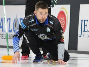 West St. Paul skip Mike McEwen looks on after delivering a stone during the sixth end of a Viterra Championship A-side semifinal against Brandon’s Terry McNamee at the men's provincial curling championship at Tundra Oil & Gas Place in Virden, Man., on Feb. 7, 2019. Nathan Liewicki/Postmedia Network