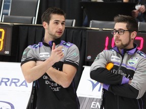 Winnipeg Beach Curling Club's Tanner Lott and his younger brother Colton discuss a scenario during the seventh end of their Viterra Championship A-side semifinal matchup against Deer Lodge's Sean Grassie during the men's provincial curling championship at Tundra Oil & Gas Place in Virden, Man., on Feb. 7, 2019. (Nathan Liewicki/Postmedia Network)