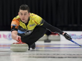 Colin Hodgson takes a shot during the 2018 Canadian Mixed Doubles Curling Championship, at the Leduc Recreation Centre Saturday March 31, 2018. Photo by David Bloom Photos for copy in Sunday, April 1 edition.