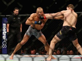 Georges St-Pierre fights Michael Bisping of England in their UFC middleweight championship bout during the UFC 217 event at Madison Square Garden on Nov. 4, 2017, in New York City.