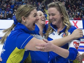 Alberta lead Rachel Brown, second Dana Ferguson and skip Chelsea Carey react after defeating Ontario 8-6 to win the Scotties Tournament of Hearts in Sydney, N.S. on Sunday, Feb. 24, 2019.
