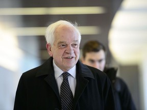 John McCallum, then still Canada's ambassador to China, arrives to brief members of the Foreign Affairs committee on Jan. 18.