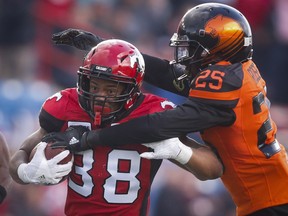 B.C. Lions' Winston Rose, right, tackles Calgary Stampeders' Terry Williams during CFL pre-season football action in Calgary, Friday, June 1, 2018.THE CANADIAN PRESS/Jeff McIntosh ORG XMIT: JMC111
