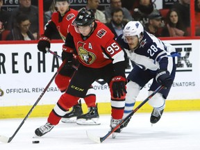 Ottawa Senators centre Matt Duchene (95) is chased by Winnipeg Jets centre Jack Roslovic (28) during second period NHL hockey action in Ottawa on Saturday.