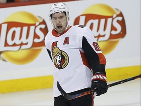 Ottawa Senators' Mark Stone (61) celebrates his goal against the Winnipeg Jets during first period NHL action in Winnipeg on Saturday, February 16, 2019. THE CANADIAN PRESS/John Woods ORG XMIT: JGW101