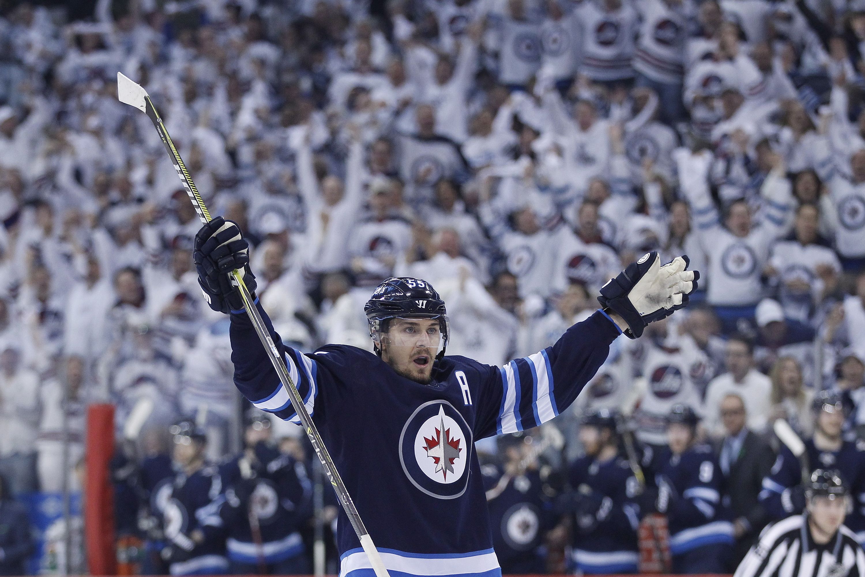Blake Wheeler of the Winnipeg Jets and Alex Pietrangelo of the St. News  Photo - Getty Images