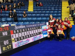 Jenine Bodner’s Iqaluit foursome beat Quebec (Gabrielle Lavoie) 4-3 on the opening draw in Sydney, N.S. on Saturday, Feb. 16, 2019, winning a game in the Canadian women’s curling championship for the first time. Bodner, who throws second stones and her teammates Jennifer Blaney (fourth), Allison Griffin (third) and lead Sadie Pinksen pose with the scoreboard.