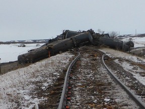 Derailed rail cars near St-Lazare, Man. are shown in a handout photo from the Transportation Safety Board. THE CANADIAN PRESS/HO-Transportation Safety Board MANDATORY CREDIT
