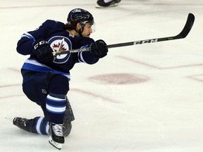 Winnipeg Jets forward Nic Petan shoots against the Washington Capitals on Wed., Nov. 14, 2018. (Kevin King/Postmedia Network)