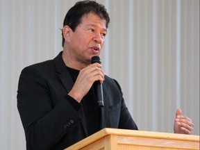 Former National Hockey League head coach Ted Nolan speaks at the 11th annual Brightening Our Paths Youth Conference at the Fisher River Community Hall in Fisher River, Man., on Friday.