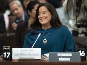Jody Wilson Raybould smiles as she waits to appear in front of the Justice committee in Ottawa, Wednesday February 27, 2019.