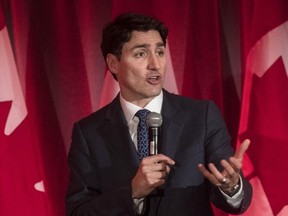 Prime Minister Justin Trudeau address attendees at the Liberal fundraising event at the Delta hotel in Toronto, Ont., on Thursday, Feb. 7, 2019. (THE CANADIAN PRESS/ Tijana Martin)