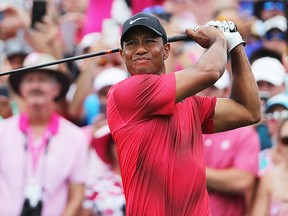 Tiger Woods of the United States plays his shot from the first tee during the final round of THE PLAYERS Championship on the Stadium Course at TPC Sawgrass on May 13, 2018 in Ponte Vedra Beach, Florida. (Richard Heathcote/Getty Images)