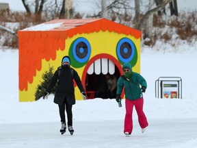 Skaters pass a warming hut along the Red River Mutual Trail at The Forks in Winnipeg on Sun., Feb. 3, 2019. Kevin King/Winnipeg Sun/Postmedia Network