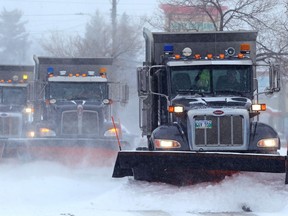 Plows clear Roblin Boulevard near McLean Street in Winnipeg on Mon., Feb. 4, 2019. Kevin King/Winnipeg Sun/Postmedia Network