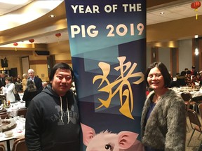 Artist Rick Wang and Winnipeg Chinese Cultural and Community Centre spokesperson Dr. Tina Chen stand next to one of the Downtown Winnipeg BIZ's 2019 Year of the Pig banners that will be go up all over Chinatown in Winnipeg. Winnipeg's Chinese community rang in the lunar new year and the Year of the Pig with a gala at Kum Koon Garden Restaurant on Sunday, Feb. 10, 2019. As well, Canada Post offically unveiled its 2019 Year of the Pig postage stamp.