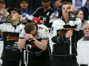 Skip William Lyburn (right), third Daley Peters (centre) and second Kyle Doering react to their imminent defeat at the hands of Team Carruthers in the 2019 Viterra provincial men's curling championship at Tundra Gas & Oil Place in Virden, Man., on Sun., Feb. 10, 2019. Kevin King/Winnipeg Sun/Postmedia Network