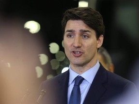 Prime Minister Justin Trudeau speaks during an announcement of funding for Winnipeg Transit projects at its Fort Rouge garage in Winnipeg on Feb. 12, 2019. Kevin King/Postmedia Network