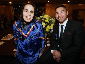 Matthew Shorting (left) and Jonathan Meikle pose after they were presented with bravery awards during a ceremony at Government House in Winnipeg on Wed., Feb. 13, 2019. Kevin King/Winnipeg Sun/Postmedia Network