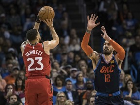 Toronto Raptors guard Fred VanVleet shoots over Oklahoma City Thunder centre Steven Adams during Wednesday's game. (AP PHOTO)