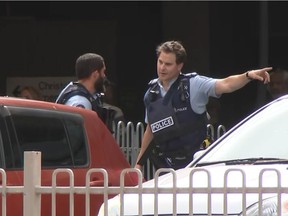 An image grab from TV New Zealand taken on Friday shows New Zealand police officers arriving outside the mosque following a shooting in Christchurch. At least one gunman who targeted crowded mosques in the New Zealand city of Christchurch killed a number of people, police said, with Prime Minister Jacinda Ardern describing the shooting as "one of New Zealand's darkest days".