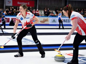 Canadian players compete during a first round match against South Korea at the LGT World Women's Curling Championship in Silkeborg, Denmark on March 16, 2019.
