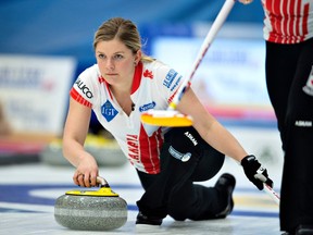 A Canadian player competes in the first round match Canada vs. Korea at the LGT World Women's Curling Championship in Silkeborg, Denmark, on March 16, 2019.