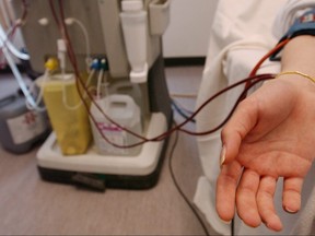 A dialysis machine attached to a patient. 
Postmedia Network File