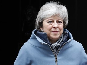 Britain's Prime Minister Theresa May leaves 10 Downing Street to attend the weekly Prime Ministers' Questions session, at parliament in London, Wednesday, March 6, 2019.