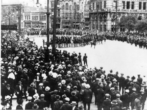 Royal North-West Mounted Police face off with strikers on Bloody Saturday, June 21, 1919.          
Courtesy Archives of Manitoba