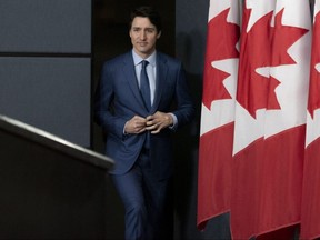 Prime Minister Justin Trudeau arrives to deliver remarks at the National Press Theatre in Ottawa on Thursday, March 7, 2019.