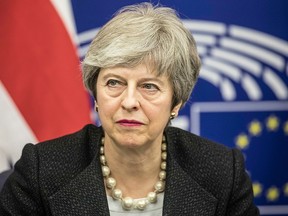 Britain's Prime Minister Theresa May, speaks during a media conference after a meeting with European Commission President Jean-Claude Juncker at the European Parliament in Strasbourg, eastern France, Monday, March 11, 2019.
