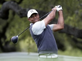 Tiger Woods watches his drive on the eighth hole during fourth round play at the Dell Technologies Match Play Championship golf tournament, Saturday, March 30, 2019, in Austin, Texas.