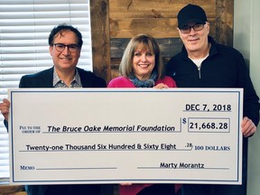 Former city councillor Marty Morantz (left) is donating his $21,000 city hall severance to the Bruce Oake Memorial Foundation in support of the Bruce Oake Recovery Centre with Anne and Scott Oake accepting, it was announced last week.
