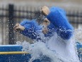 A participant takes the plunge at the seventh annual Winnipeg Polar Plunge for Special Olympics Manitoba on Saturday.