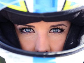 Amber Balcaen poses for a photograph at the shop in her family home on Fri., April 29, 2016. The 24-year-old stock car racer from Winnipeg is trying to get to NASCAR's top level. Kevin King/Winnipeg Sun/Postmedia Network