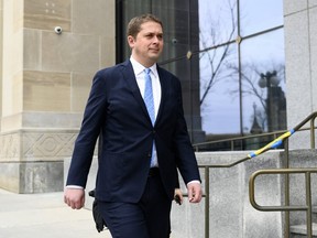 Conservative leader Andrew Scheer walks to a press conference at the National Press Theatre in Ottawa on April 7, 2019. (THE CANADIAN PRESS)